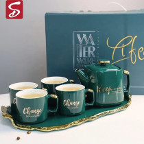 Ensemble de 4 tasses et théière avec assiette en porcelaine